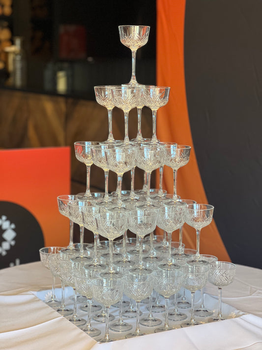 5 tier Champagne Tower set against a corporate banner. This is the OG Ninja Tower